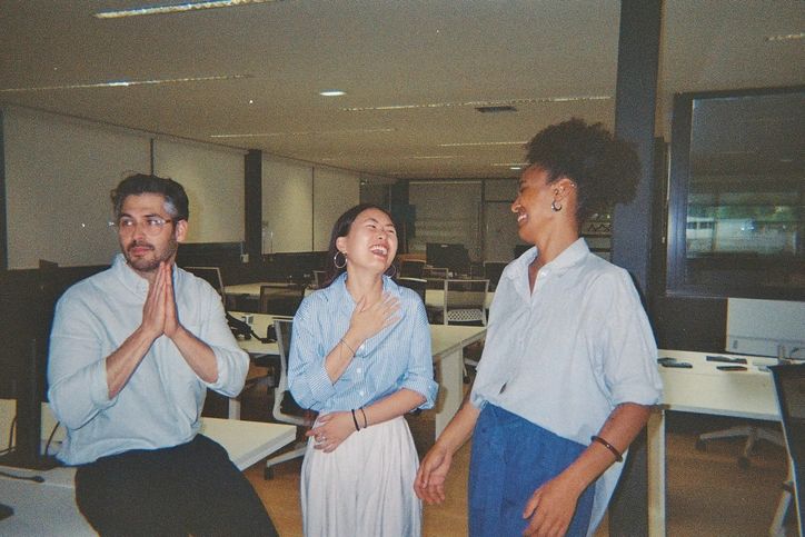 Founders and colleagues sharing a candid moment while building together